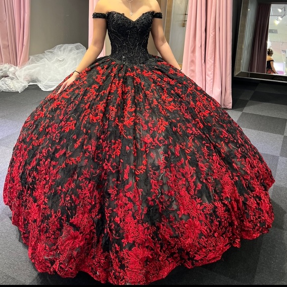 Brand new black and red quinceañera dress.